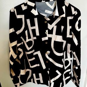 Beautiful never worn women’s blouse. Very stylish